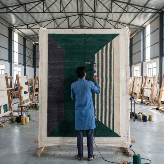 Qu'est-ce qu'un tapis tufté main ?
